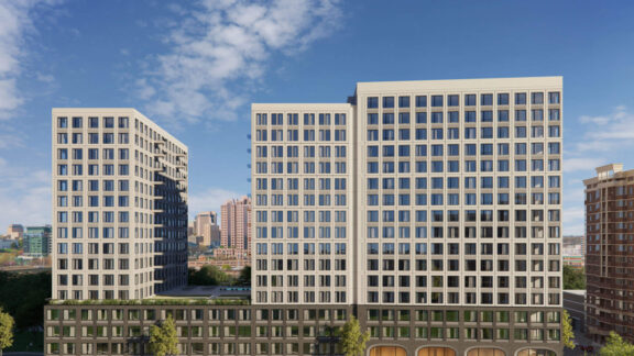 A rendering of an apartment building during the day