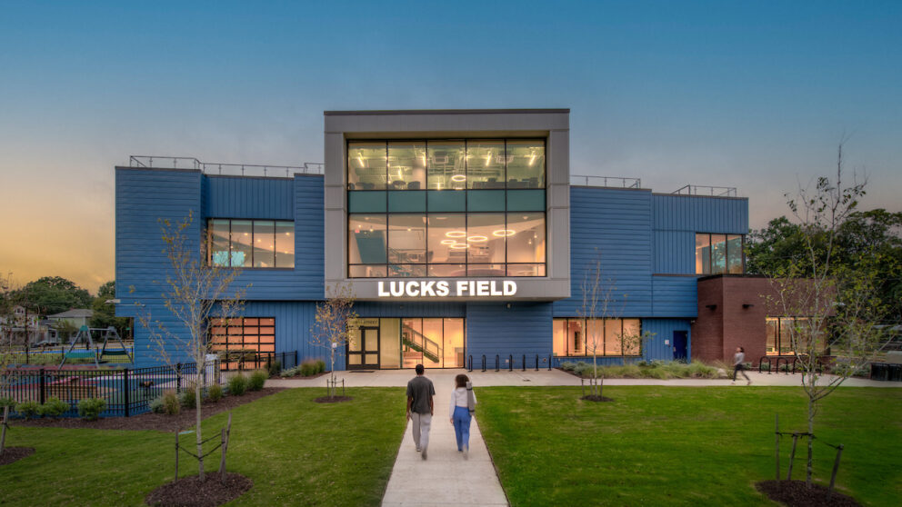 A rendering outside of the Lucks Field Community Center at sunset.