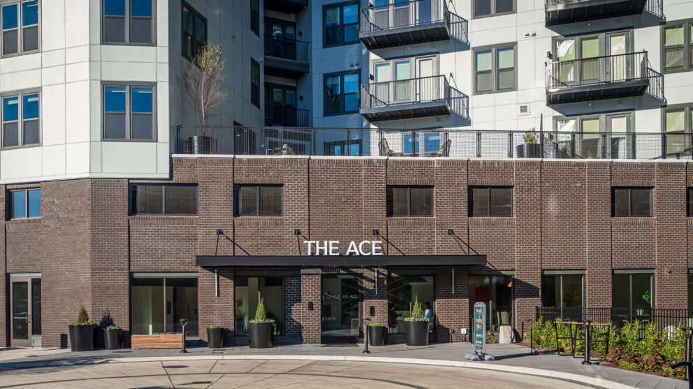 The main doorway of The Ace with a large white sign that says The Ace