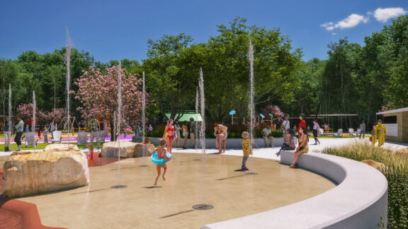 A rendering of children in swimsuits playing in a water-playground while parents watch on.