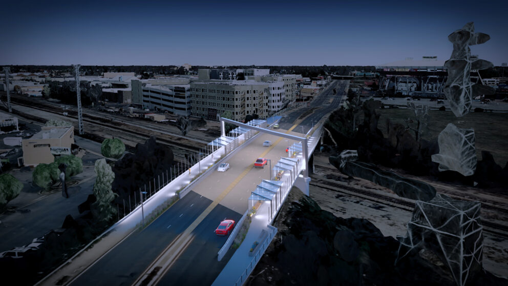 A rendering of cars passing the bridge at night.