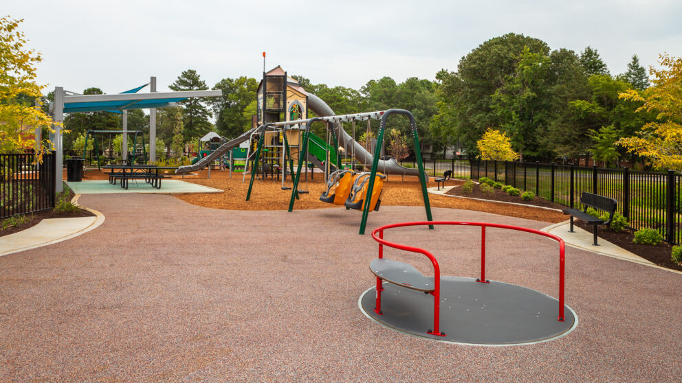 A piece of spinning play equipment at the playground at Beulah Park.