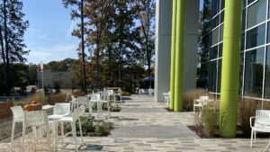 The patio on the side of the Feed More Headquarters with seating in the autumn